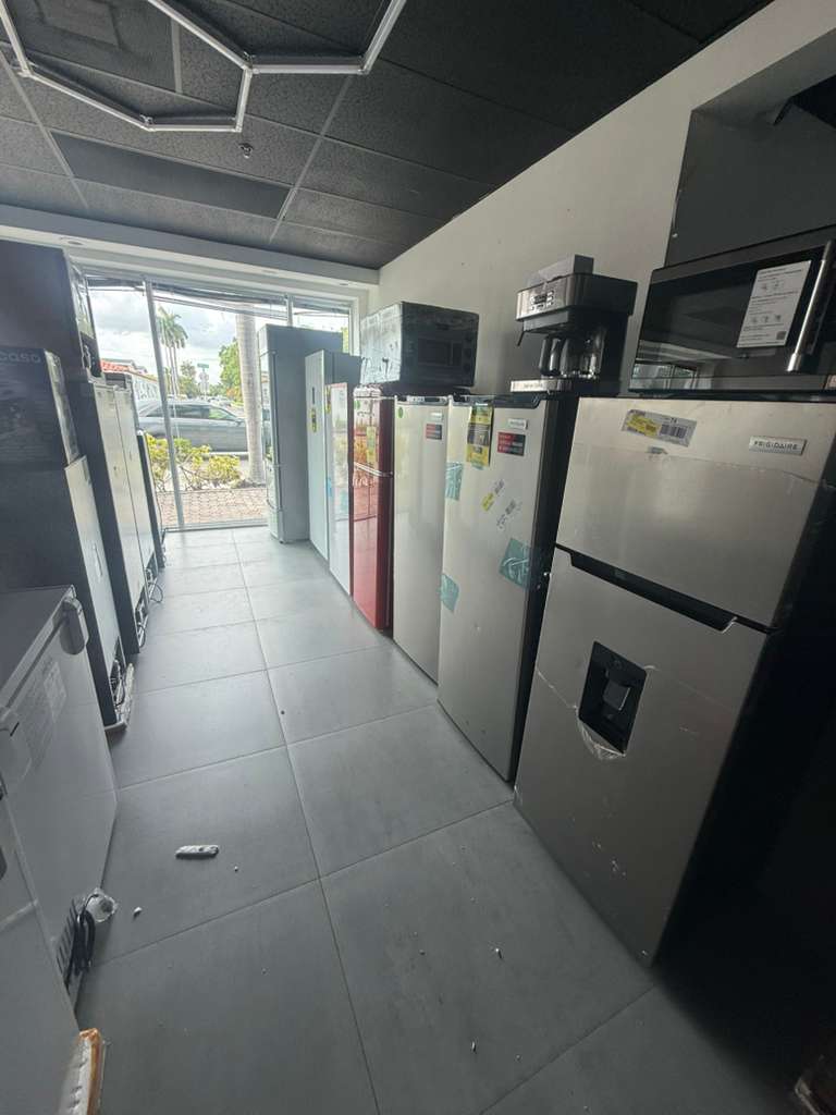 Refrigerators and appliances on display inside the Easy Home Appliances store